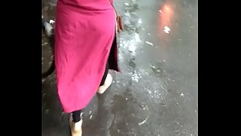 Typical Indian Bhabhi trying expose her Curvy Ass in Public